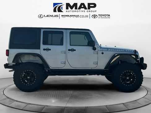 Used 2010 Jeep Wrangler Unlimited Rubicon w/ Dual Top Group image 6