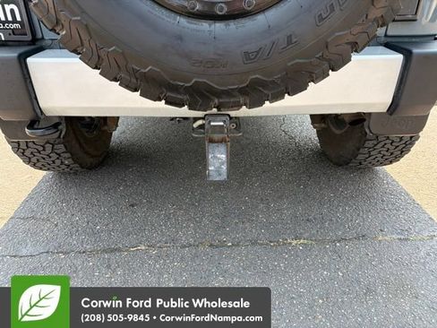 Used 2014 Jeep Wrangler Unlimited Sahara w/ Dual Top Group AWD/4WD image 12