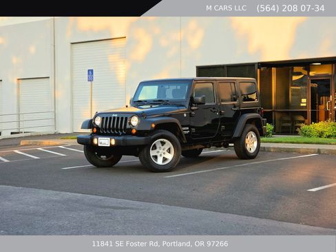 Used 2013 Jeep Wrangler Unlimited Sport AWD/4WD image 1
