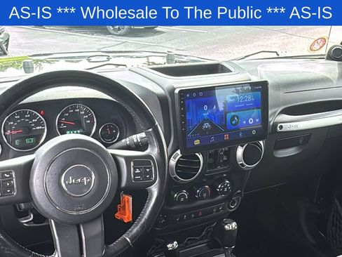 Used 2012 Jeep Wrangler Unlimited Sahara w/ Dual Top Group AWD/4WD image 13
