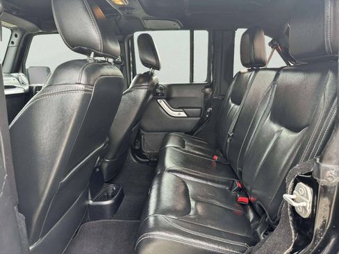 Used 2015 Jeep Wrangler Unlimited Rubicon w/ Dual Top Group AWD/4WD image 11