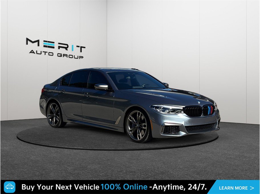 Used 2020 BMW M550i xDrive w/ Executive Package AWD/4WD image 1