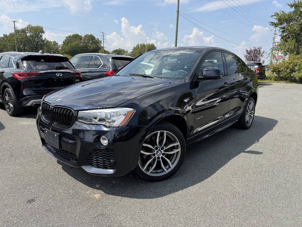 Used 2016 BMW X4 xDrive35i AWD/4WD image 1