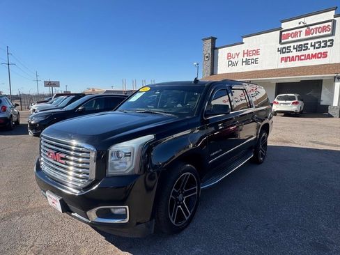 Used 2015 GMC Yukon XL SLT w/ Open Road Package AWD/4WD image 1