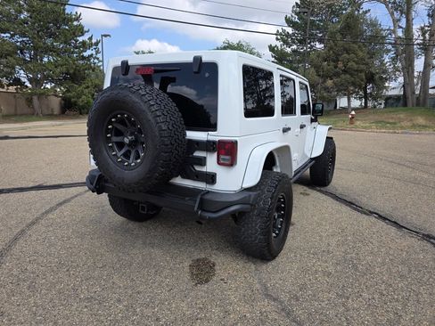 Used 2013 Jeep Wrangler Unlimited Sahara w/ Dual Top Group AWD/4WD image 7