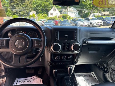 Used 2016 Jeep Wrangler Unlimited Sahara w/ Dual Top Group AWD/4WD image 24