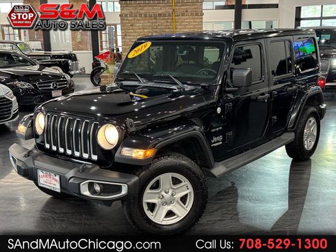 Used 2019 Jeep Wrangler Unlimited Sahara w/ Uconnect 4C Nav & Sound Group AWD/4WD image 1