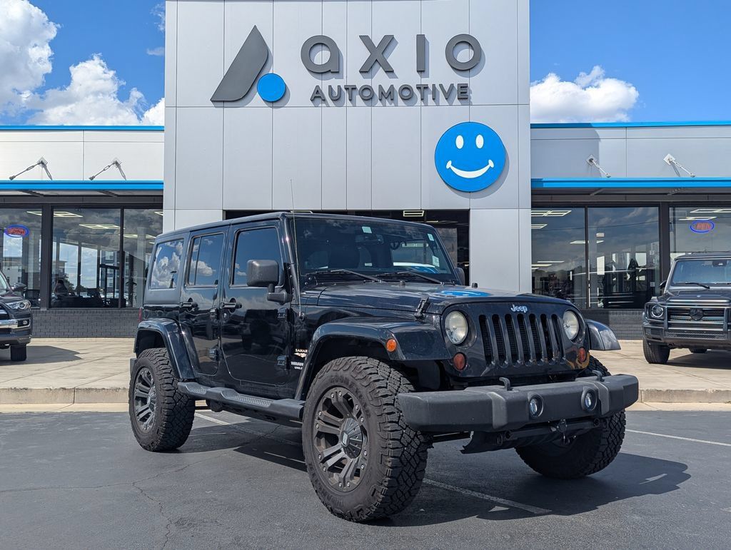 Used 2013 Jeep Wrangler Unlimited Sahara w/ Max Tow Pkg AWD/4WD image 1