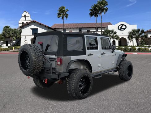 Used 2012 Jeep Wrangler Unlimited Rubicon w/ Dual Top Group AWD/4WD image 2