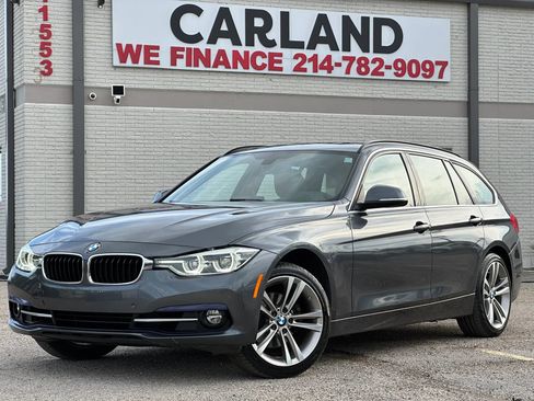 Used 2017 BMW 330i xDrive Wagon AWD/4WD image 1