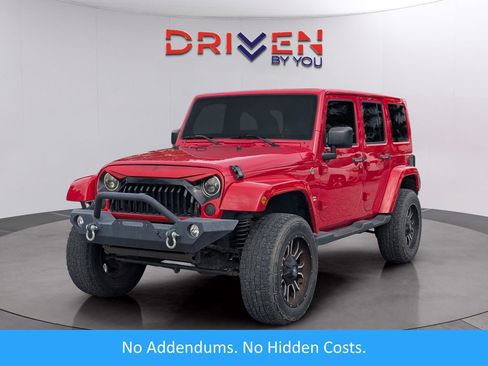 Used 2014 Jeep Wrangler Unlimited Sahara w/ Dual Top Group AWD/4WD image 1