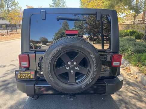 Used 2015 Jeep Wrangler Unlimited Sport w/ Dual Top Group AWD/4WD image 10
