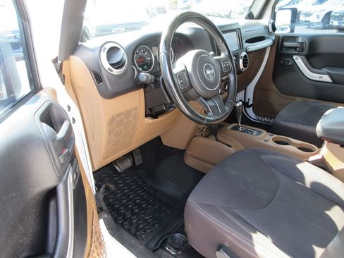 Used 2014 Jeep Wrangler Unlimited Sahara w/ Dual Top Group AWD/4WD image 14