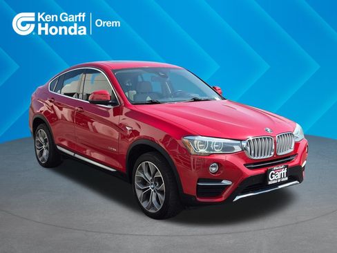 Used 2015 BMW X4 xDrive35i AWD/4WD image 1