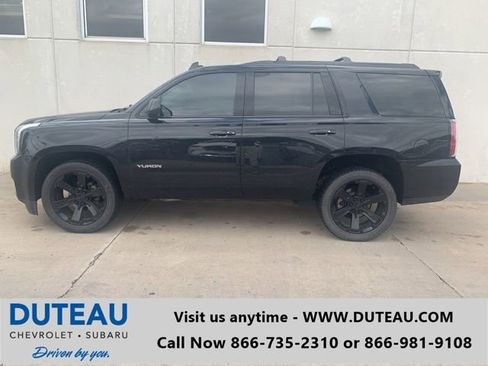 Used 2019 GMC Yukon SLT w/ Graphite Performance Edition AWD/4WD image 1