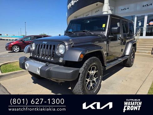 Used 2014 Jeep Wrangler Unlimited Sahara w/ Max Tow Package AWD/4WD image 1
