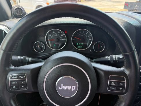 Used 2012 Jeep Wrangler Unlimited Sahara w/ Dual Top Group AWD/4WD image 19