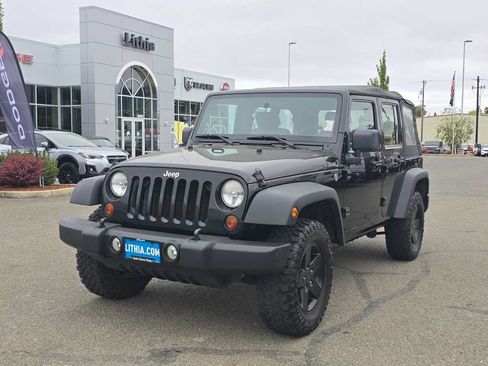 Used 2010 Jeep Wrangler Unlimited Sport w/ Trailer Tow Group AWD/4WD image 1