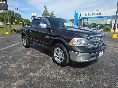 Used 2018 RAM 1500 Laramie AWD/4WD image 1
