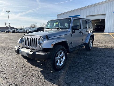 Used 2015 Jeep Wrangler Unlimited Sahara w/ Dual Top Group image 1