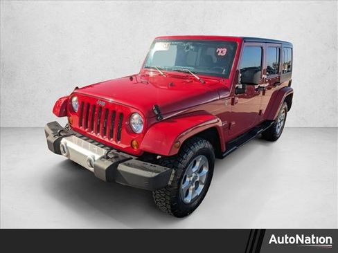 Used 2013 Jeep Wrangler Unlimited Sahara w/ Max Tow Pkg image 1