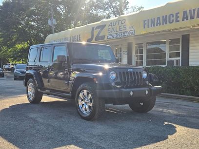 Used 2014 Jeep Wrangler Unlimited Sahara w/ Dual Top Group