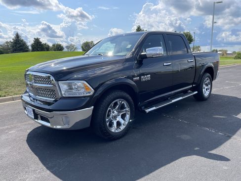 Used 2015 RAM 1500 Laramie w/ Convenience Group AWD/4WD image 1