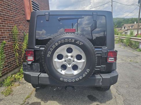 Used 2012 Jeep Wrangler Unlimited Rubicon w/ Dual Top Group image 3