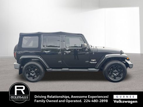 Used 2011 Jeep Wrangler Unlimited Sahara w/ Dual Top Group AWD/4WD image 10