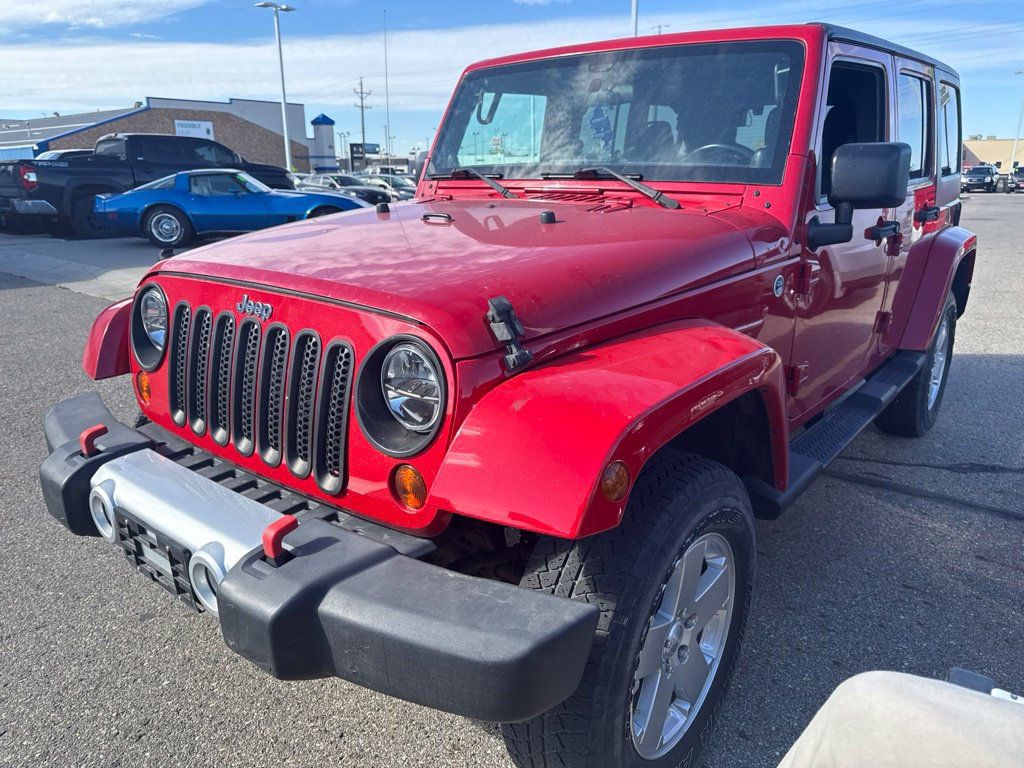 Used 2012 Jeep Wrangler Unlimited Sahara w/ Dual Top Group AWD/4WD image 3