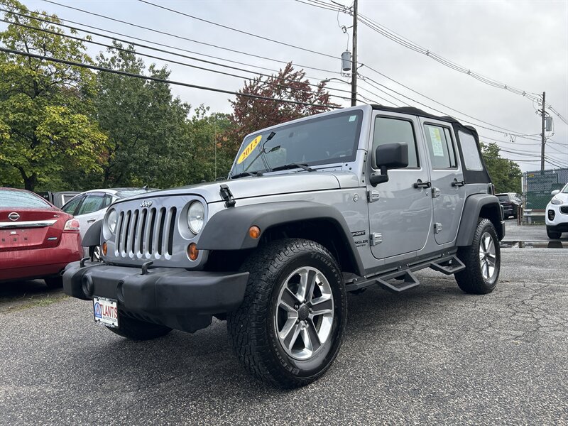 Used 2013 Jeep Wrangler Unlimited Sport AWD/4WD image 1