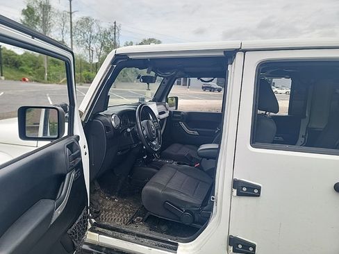 Used 2012 Jeep Wrangler Unlimited Sahara w/ Dual Top Group AWD/4WD image 11