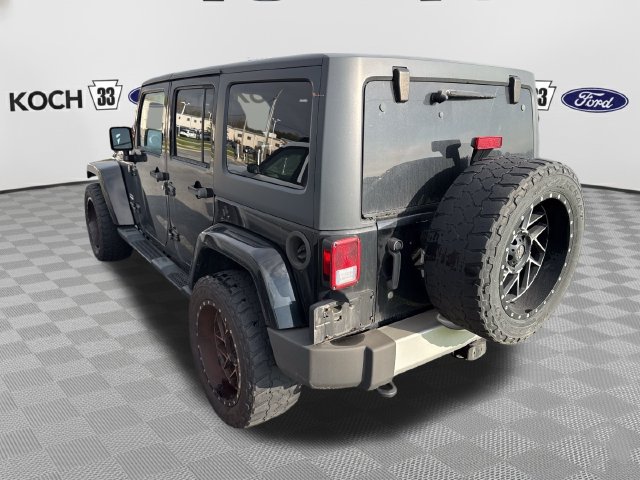 Used 2014 Jeep Wrangler Unlimited Sahara w/ Dual Top Group AWD/4WD image 4