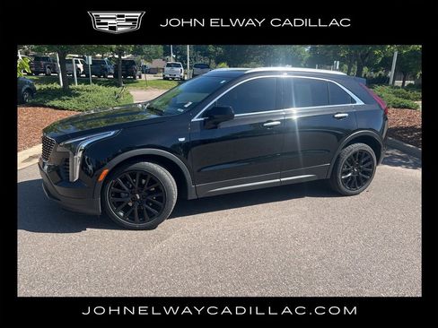 Used 2023 Cadillac XT4 Luxury w/ LPO, Onyx Lite Package AWD/4WD image 1