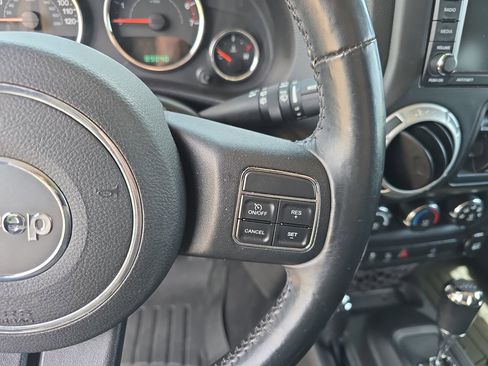 Used 2013 Jeep Wrangler Unlimited Sahara w/ Dual Top Group AWD/4WD image 17