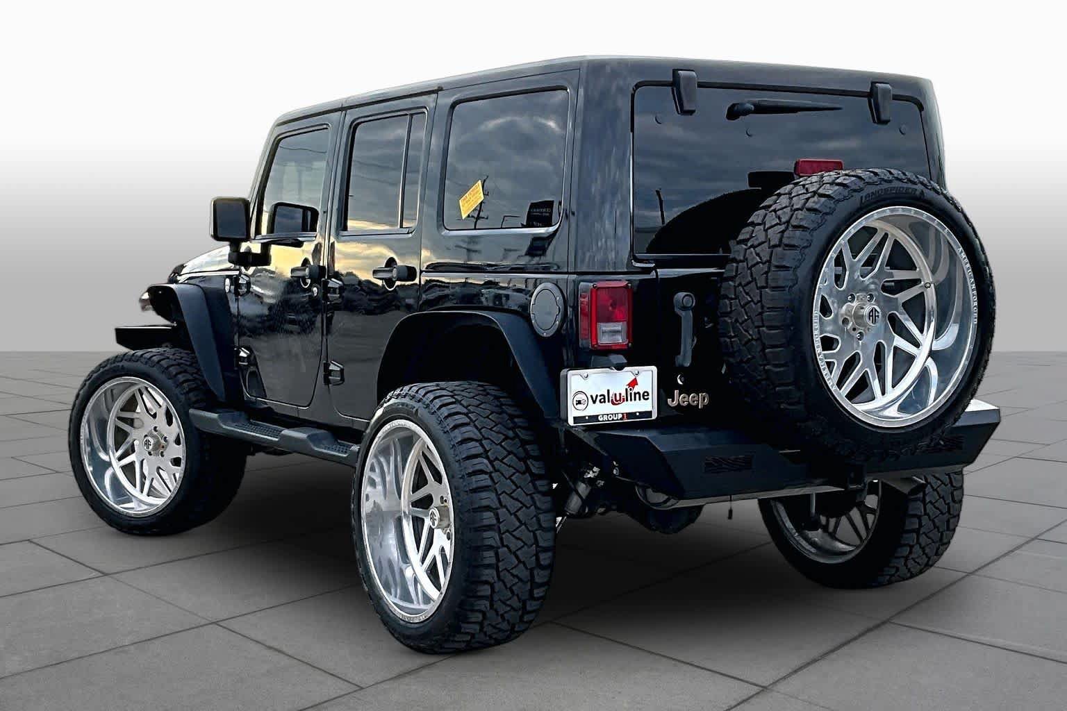 Used 2014 Jeep Wrangler Unlimited Sahara AWD/4WD image 12