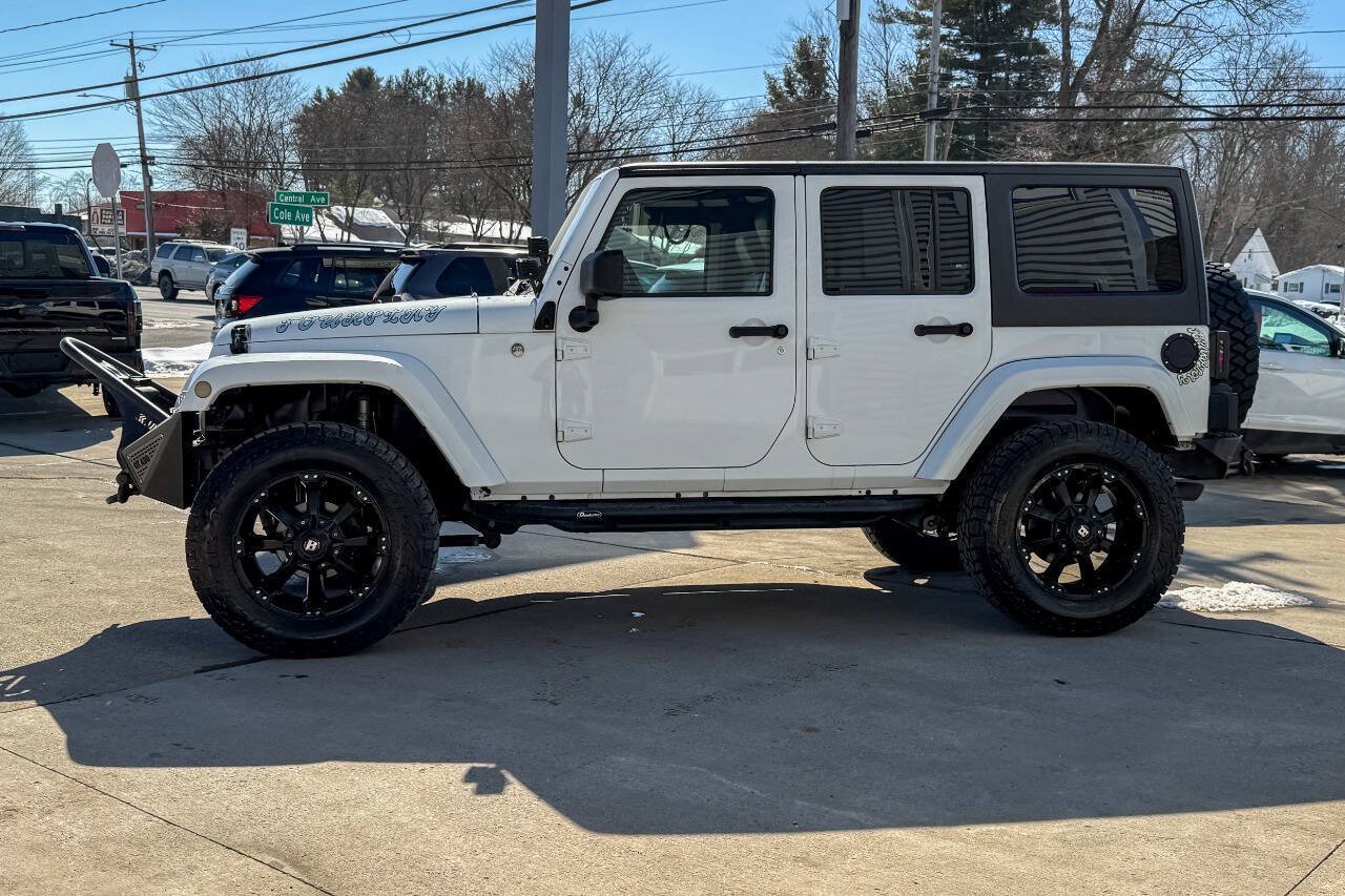 Used 2014 Jeep Wrangler Unlimited Sahara w/ Dual Top Group AWD/4WD image 7
