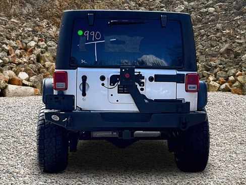 Used 2012 Jeep Wrangler Unlimited Rubicon w/ Dual Top Group AWD/4WD image 4