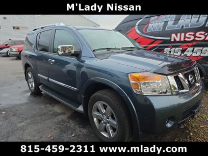 Used 2014 Nissan Armada Platinum w/ 2nd Row Captain Seat Package