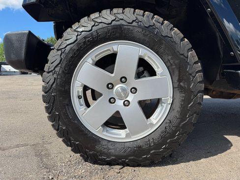 Used 2012 Jeep Wrangler Unlimited Sahara w/ Dual Top Group AWD/4WD image 13