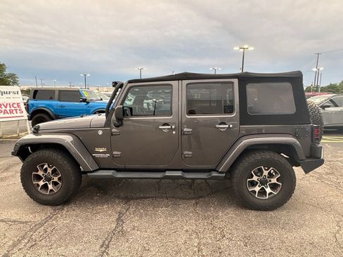 Used 2014 Jeep Wrangler Unlimited Sahara w/ Connectivity Group AWD/4WD image 7