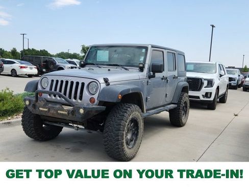 Used 2013 Jeep Wrangler Unlimited Sport AWD/4WD image 1