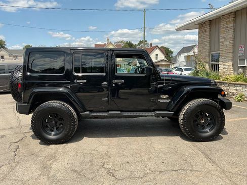 Used 2014 Jeep Wrangler Unlimited Sahara w/ Katzin Premium Leather Group AWD/4WD image 3