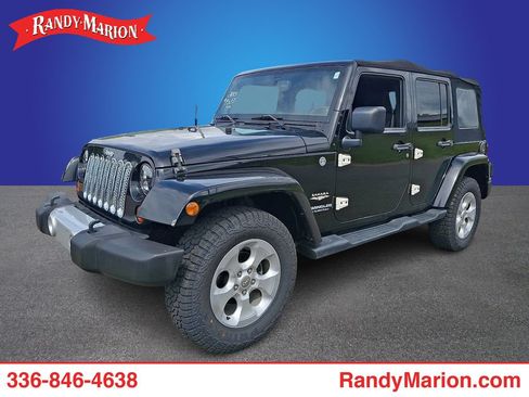 Used 2013 Jeep Wrangler Unlimited Sahara w/ Connectivity Group AWD/4WD image 1