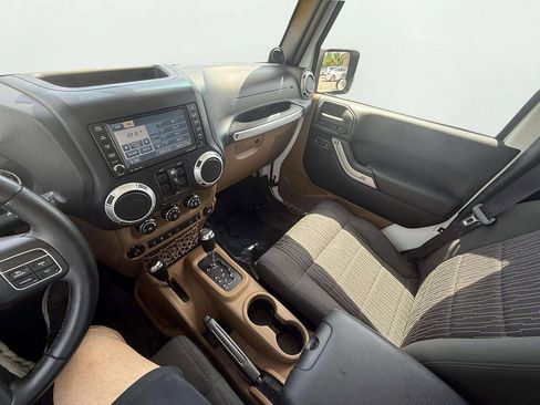 Used 2012 Jeep Wrangler Unlimited Sahara w/ Dual Top Group AWD/4WD image 18