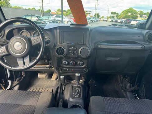 Used 2012 Jeep Wrangler Unlimited Sport AWD/4WD image 16