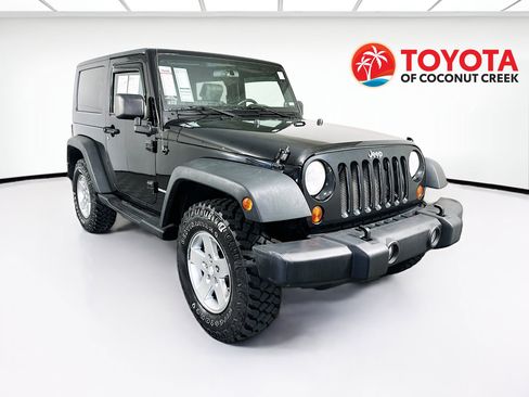 Used 2010 Jeep Wrangler Rubicon w/ Dual Top Group image 1