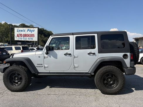 Used 2012 Jeep Wrangler Unlimited Sport AWD/4WD image 2