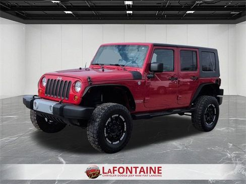 Used 2010 Jeep Wrangler Unlimited Sahara w/ Dual Top Group image 1