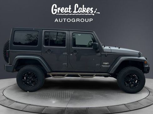 Used 2014 Jeep Wrangler Unlimited Sahara w/ Dual Top Group AWD/4WD image 6